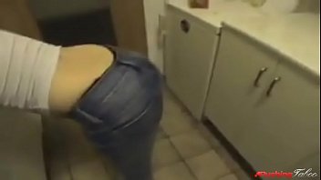 Teen daughter bent over by dad in the kitchen